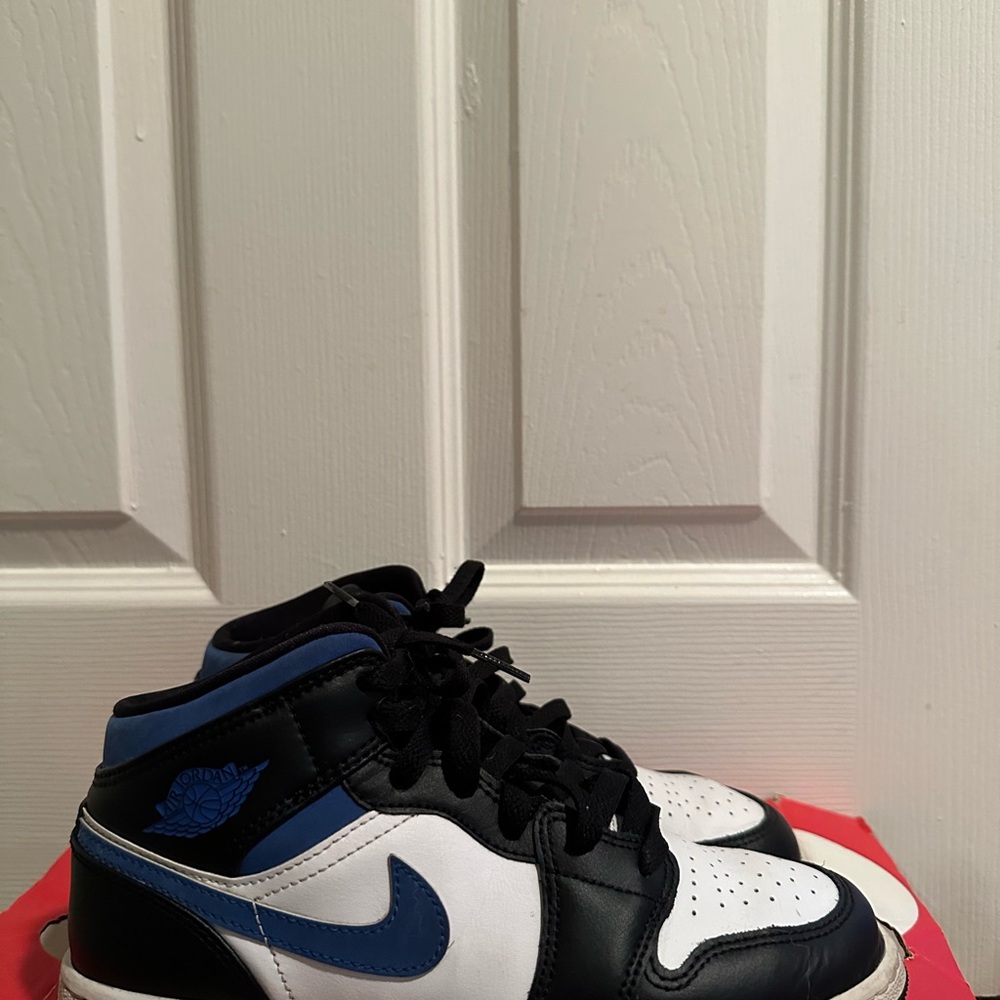 Jordan Kids Black and White Sneakers with Blue Accents
